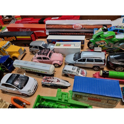 26 - A large quantity of various diecast cars and lorries including a quantity of truck trailers with adv... 