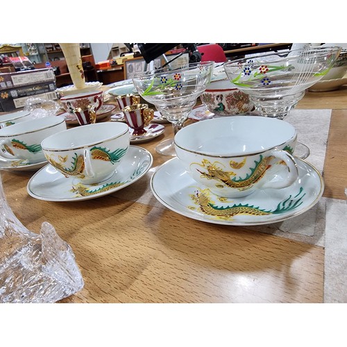 37 - A quantity of collectables to include a set of 4 Chinese cups and saucers with a hand painted design... 