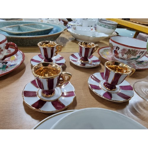 37 - A quantity of collectables to include a set of 4 Chinese cups and saucers with a hand painted design... 