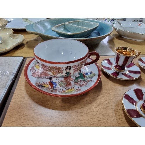 37 - A quantity of collectables to include a set of 4 Chinese cups and saucers with a hand painted design... 