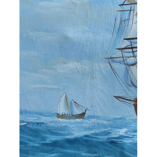 87 - An ornate gilt framed oil on canvas maritime picture of a clipper in good order. Height 71cm, length... 