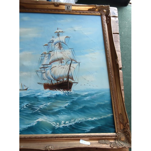 87 - An ornate gilt framed oil on canvas maritime picture of a clipper in good order. Height 71cm, length... 