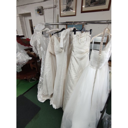 93 - A quantity of 6x various wedding dresses, some new with tags to include some good brand names, inclu... 