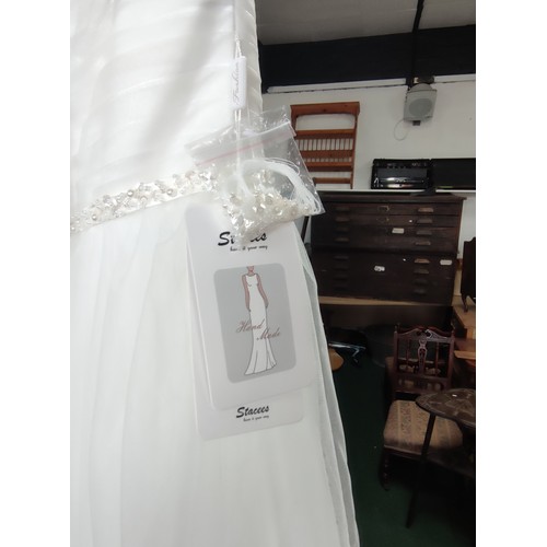 93 - A quantity of 6x various wedding dresses, some new with tags to include some good brand names, inclu... 