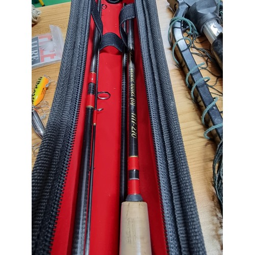 41 - A comprehensive fly fishing set to include a cased Shakespeare deluxe travel fly rod as spares or re... 