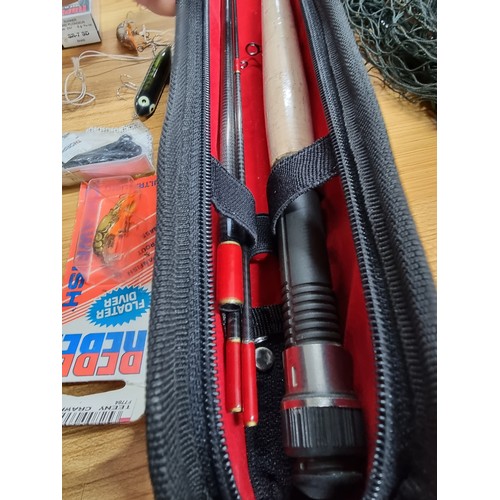 41 - A comprehensive fly fishing set to include a cased Shakespeare deluxe travel fly rod as spares or re... 