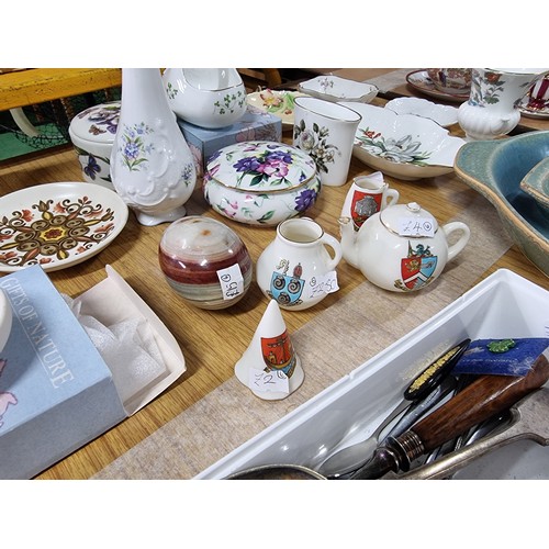 42 - A large collection of collectable china to include many pin dishes, Derby, Worcester, Carlton ware e... 