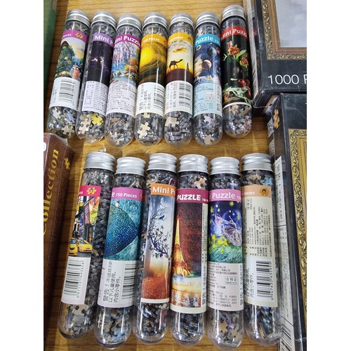 43 - A large collection of new and sealed puzzles to include 6x large puzzle sets, along with 13x mini pu... 