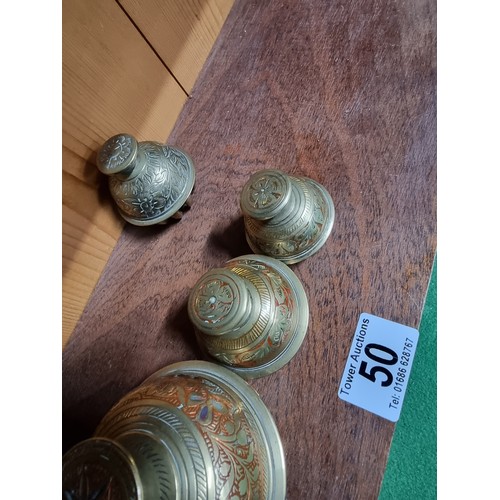 50 - A collection of 6 brass bells to include 5x vintage graduated indian elephant claw bells (4 are matc... 