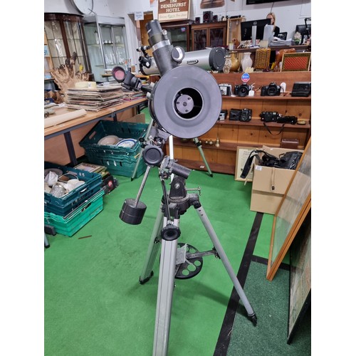 53 - A good quality vintage telescope with tripod stand by Celestron, model firstscope 114 compact 31041.... 