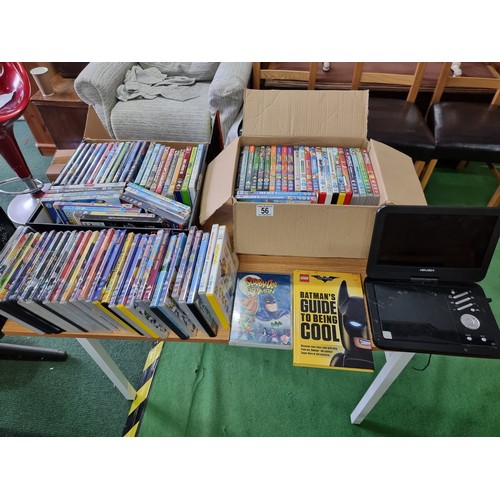 56 - 2x boxes full of various DVD's, mostly animated films and children's films along with a portable DVD... 