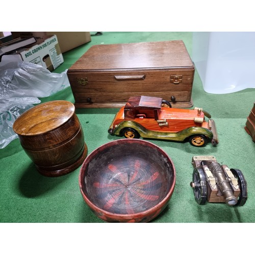 60 - A box full of good quality wooden treen items to include well made lidded pots, a honey pot, puzzle ... 