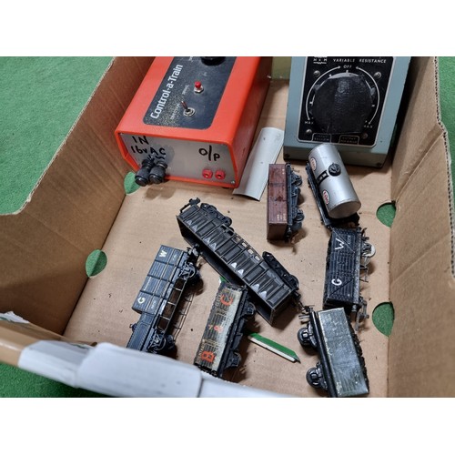 61 - A box of model railway accessories to include 2 train controllers, rolling stock OO gauge, a quantit... 