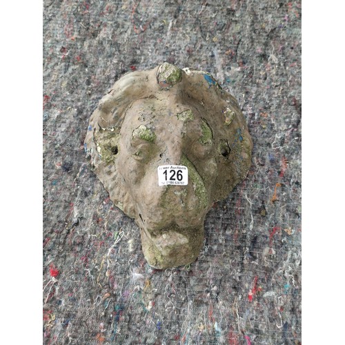 126 - Lion formed wall mounted plaque great patina of stone with good age 30cm high