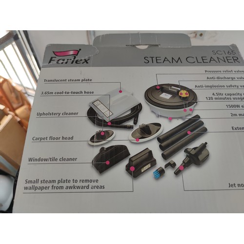 124 - Boxed Farlex steam cleaner many used inc wallpaper stripping complete with its accessories