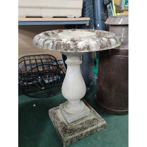 127 - Stone pedestal bird bath in good order with good patina separates into three section and is 78cm hig... 