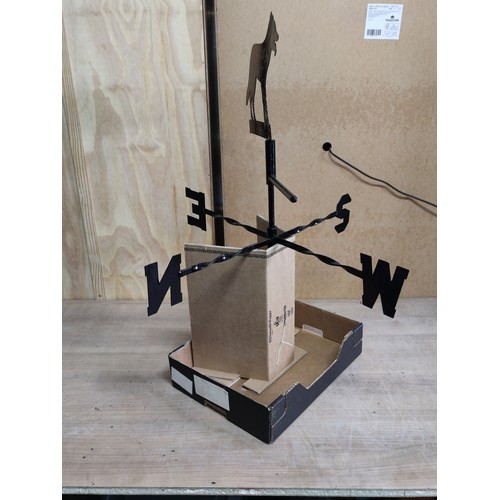 142 - Weather vane in the form of a Border Collie of metal and in good order stand 76cm high