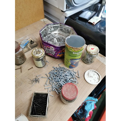 161 - Large collection of jars containing a qunatity of screws, washers, nails etc