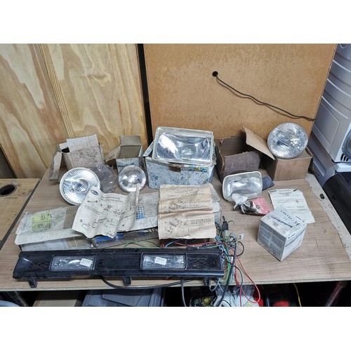 179 - Quantity of vintage car lights inc a Mazda 323 cluster light in box, Wagner sealed lights, Cortina h... 