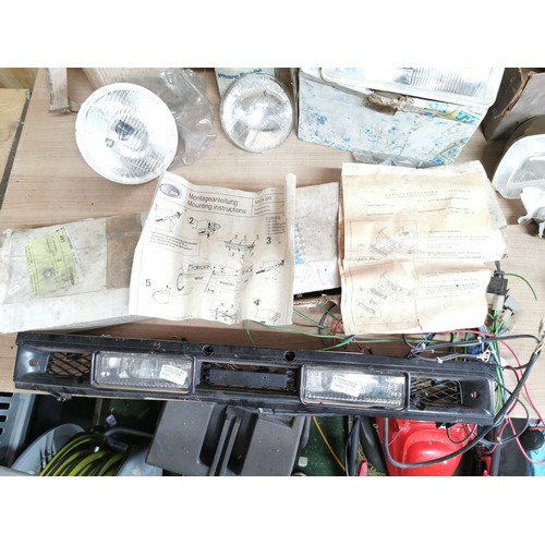 179 - Quantity of vintage car lights inc a Mazda 323 cluster light in box, Wagner sealed lights, Cortina h... 