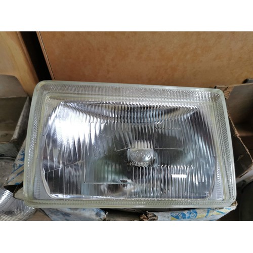 179 - Quantity of vintage car lights inc a Mazda 323 cluster light in box, Wagner sealed lights, Cortina h... 