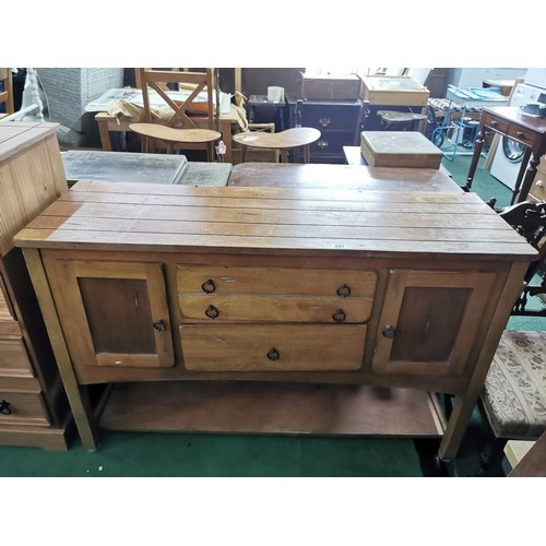 397 - Solid beech side board with a purposely aged design featuring two doors and two drawers with ring ha... 