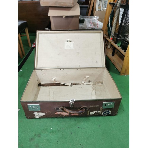 399 - Large early vintage travel trunk with a leather handle along with travel stickers and labels height ... 