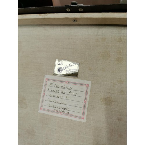 399 - Large early vintage travel trunk with a leather handle along with travel stickers and labels height ... 