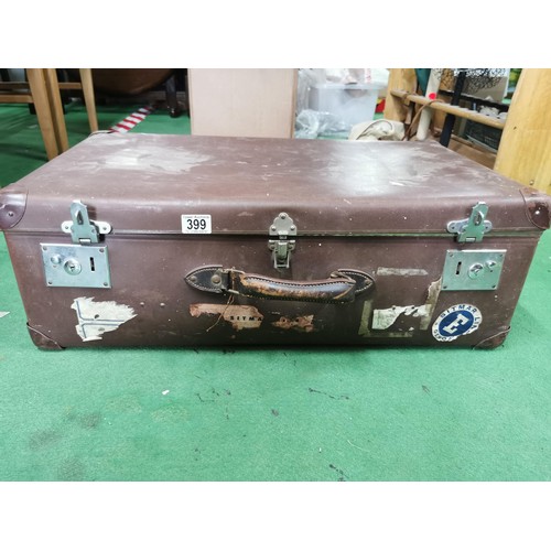 399 - Large early vintage travel trunk with a leather handle along with travel stickers and labels height ... 