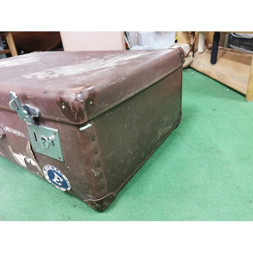 399 - Large early vintage travel trunk with a leather handle along with travel stickers and labels height ... 