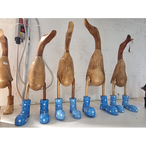 108A - Quantity of 7x fairtrade ducks in coloured boots all new in good order tallest piece measures 45cm h... 