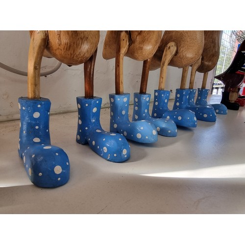 108A - Quantity of 7x fairtrade ducks in coloured boots all new in good order tallest piece measures 45cm h... 