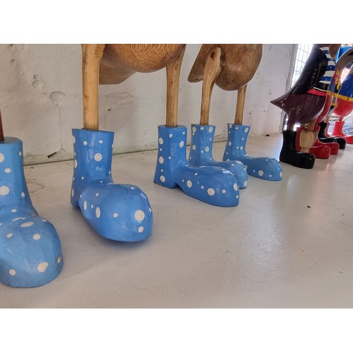 108A - Quantity of 7x fairtrade ducks in coloured boots all new in good order tallest piece measures 45cm h... 