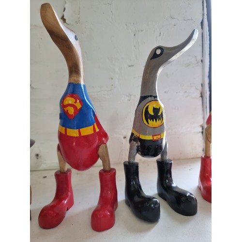 108B - Quantity of 8x fairtrade items inc ducks in boots inc Batman, 2x Superman a pirate and 2 sitting duc... 