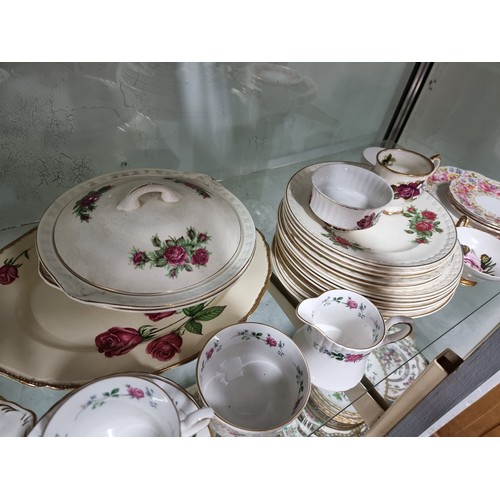 80A - A large comprehensive quantity of part/tea sets with various makers to include Crown Staffordshire, ... 