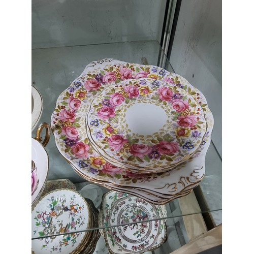 80A - A large comprehensive quantity of part/tea sets with various makers to include Crown Staffordshire, ... 