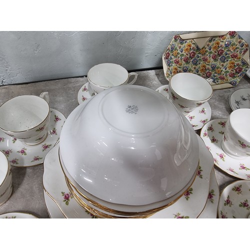 80A - A large comprehensive quantity of part/tea sets with various makers to include Crown Staffordshire, ... 