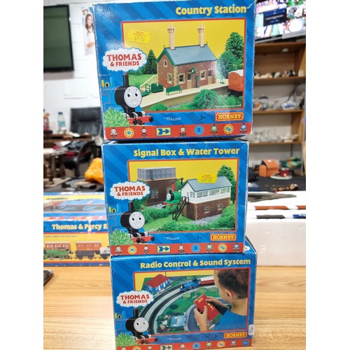2 - A boxed Hornby R9054 Thomas and Percy train set along with 3 boxed Thomas the tank engine accessorie... 