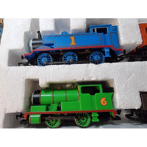 2 - A boxed Hornby R9054 Thomas and Percy train set along with 3 boxed Thomas the tank engine accessorie... 