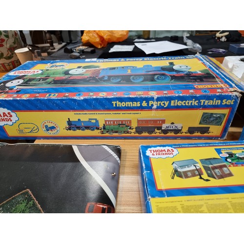 2 - A boxed Hornby R9054 Thomas and Percy train set along with 3 boxed Thomas the tank engine accessorie... 
