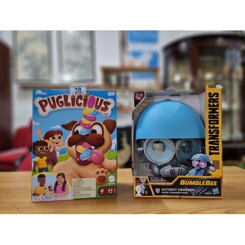 38 - 2 boxed as new toys to include Transformers bumblebee autobot voice changer mask and a Mattel Puglic... 