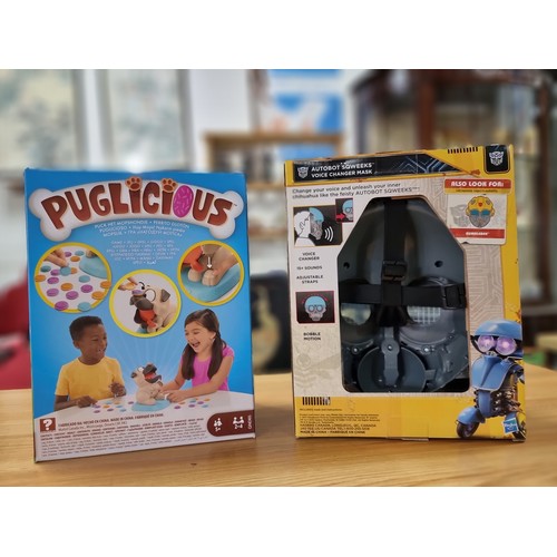 38 - 2 boxed as new toys to include Transformers bumblebee autobot voice changer mask and a Mattel Puglic... 