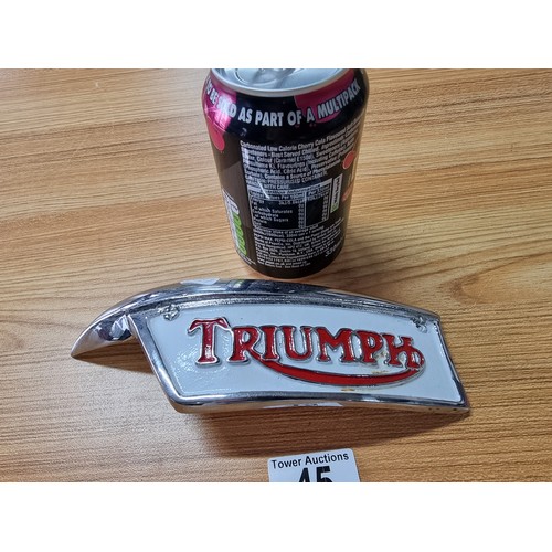 A rare large chrome and enamel belt buckle for Triumph Motorcycles