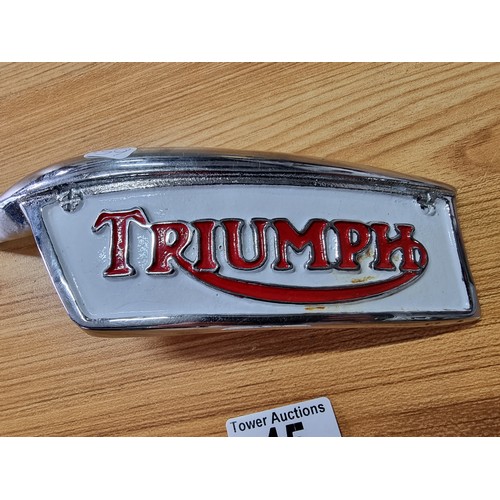 A rare large chrome and enamel belt buckle for Triumph Motorcycles