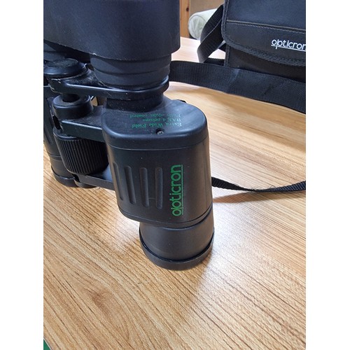 56 - 2 pairs of good quality binoculars including a cased set of Opticron 8x42 WA and a Iokoh Yukon 7x50 ... 