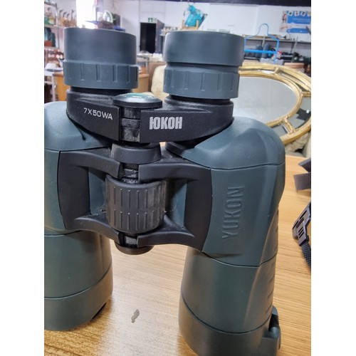 56 - 2 pairs of good quality binoculars including a cased set of Opticron 8x42 WA and a Iokoh Yukon 7x50 ... 