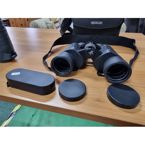 56 - 2 pairs of good quality binoculars including a cased set of Opticron 8x42 WA and a Iokoh Yukon 7x50 ... 