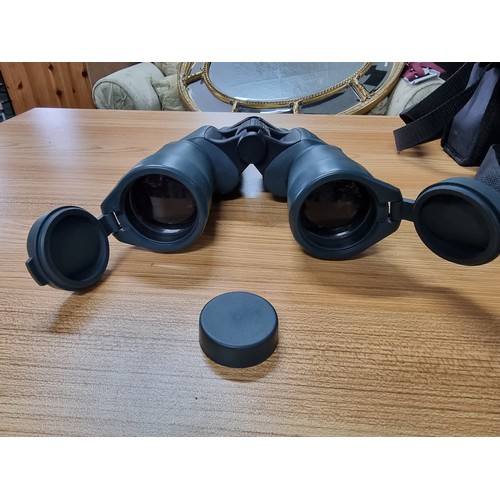 56 - 2 pairs of good quality binoculars including a cased set of Opticron 8x42 WA and a Iokoh Yukon 7x50 ... 