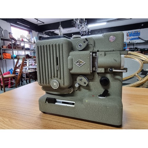 58 - Eumig P8 Super 8 projector and one other handheld along with a quantity of rare and collectable supe... 