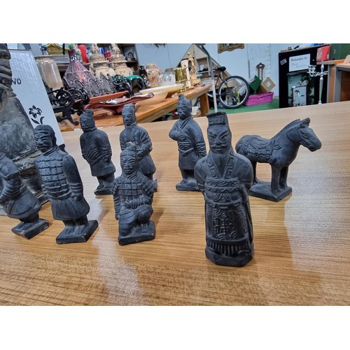 353 - A quantity of terracotta army figures, 9 in total, along with 2 boxed as new 'tea for 2' sets by Flo... 